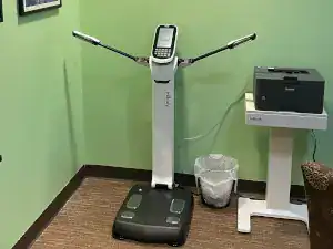 Close up of BIA body composition scanner